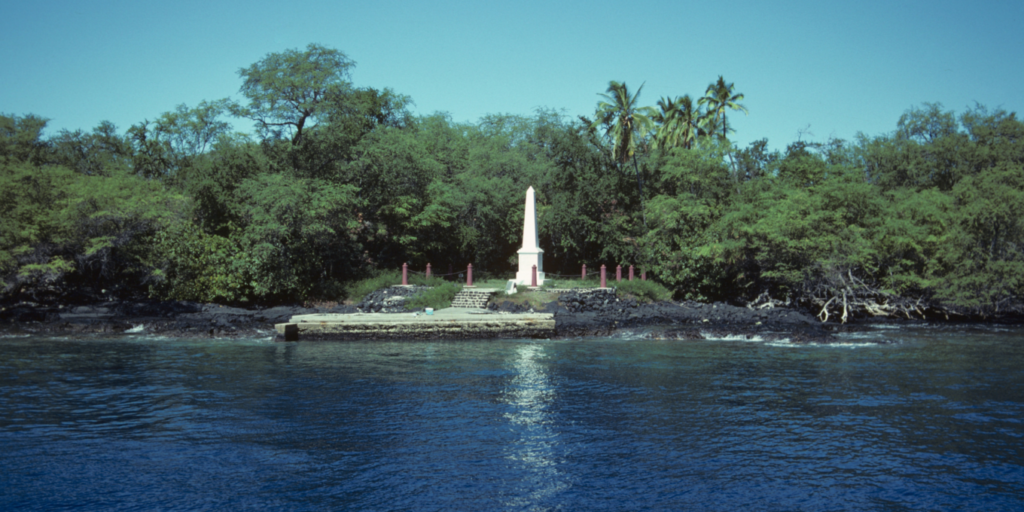 Looking out from sea at the Captain Cook Memorial on the big island of Hawaii