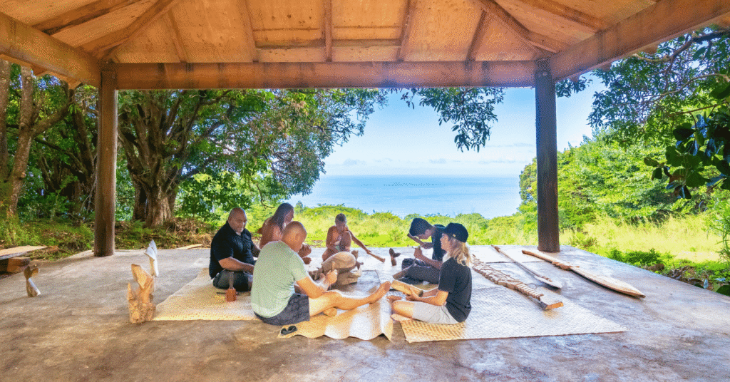 A tour group carving a tiki at Aloha Adventure Farms - best Polynesian tour