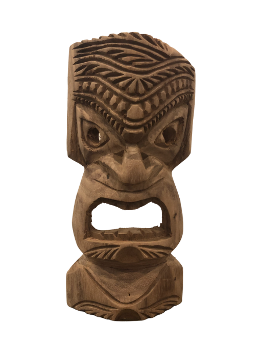 Local tiki wood carving from Big Island with dramatic face