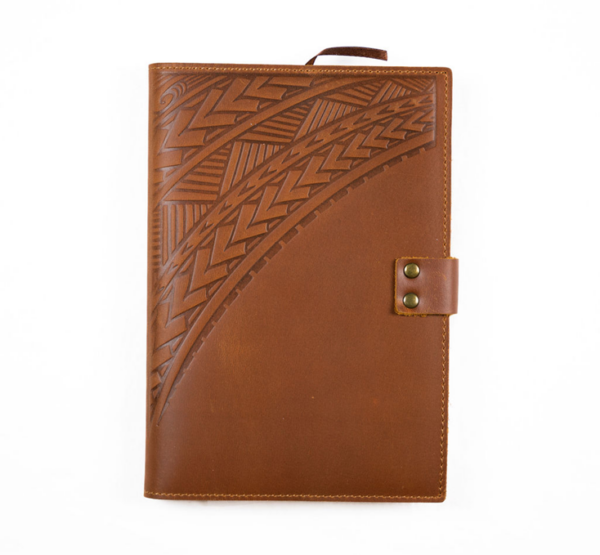 Shaka Tribe leather journal with Polynesian design debossed in leather