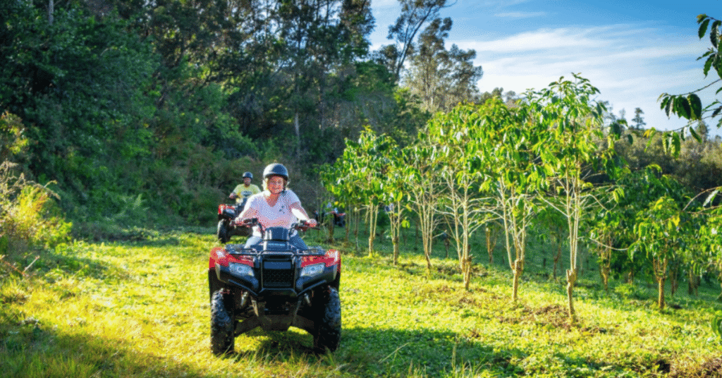 participants on kona atv tour driving through jungle